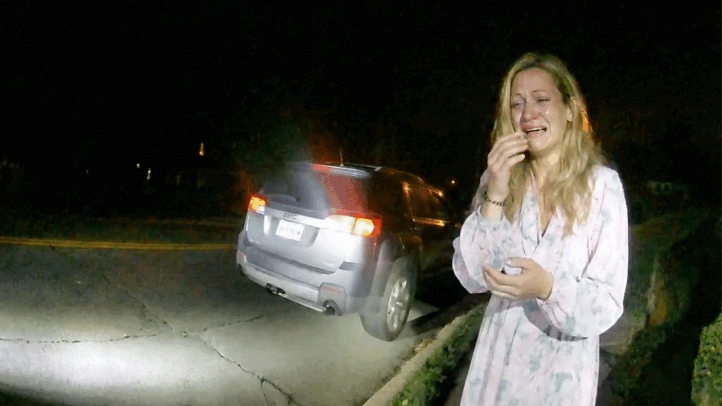 Little Silver police bodycam drug arrest scene showing officers searching a gray wagon.