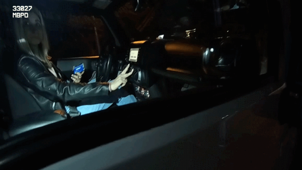 Alexa Nesbihal DWI Arrest showing officers at the scene.