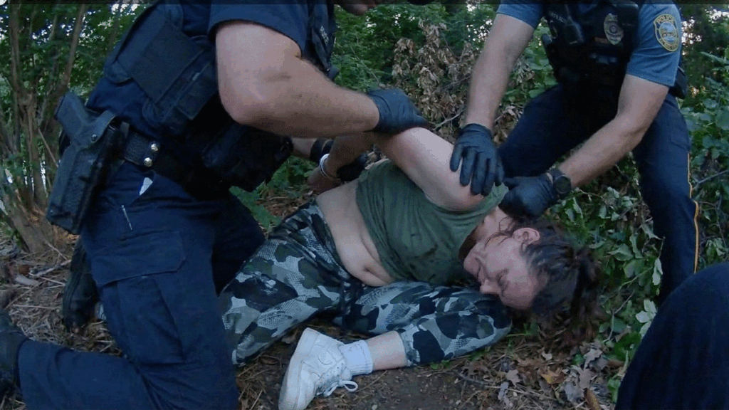 Colts Neck Police Bodycam showing officers arresting suspect Amanda Johnson in the woods.