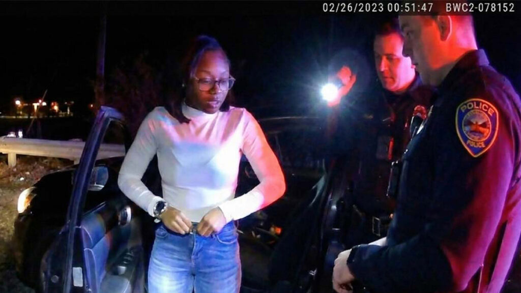 Highlands NJ DWI Arrest showing police cruiser lights at night.