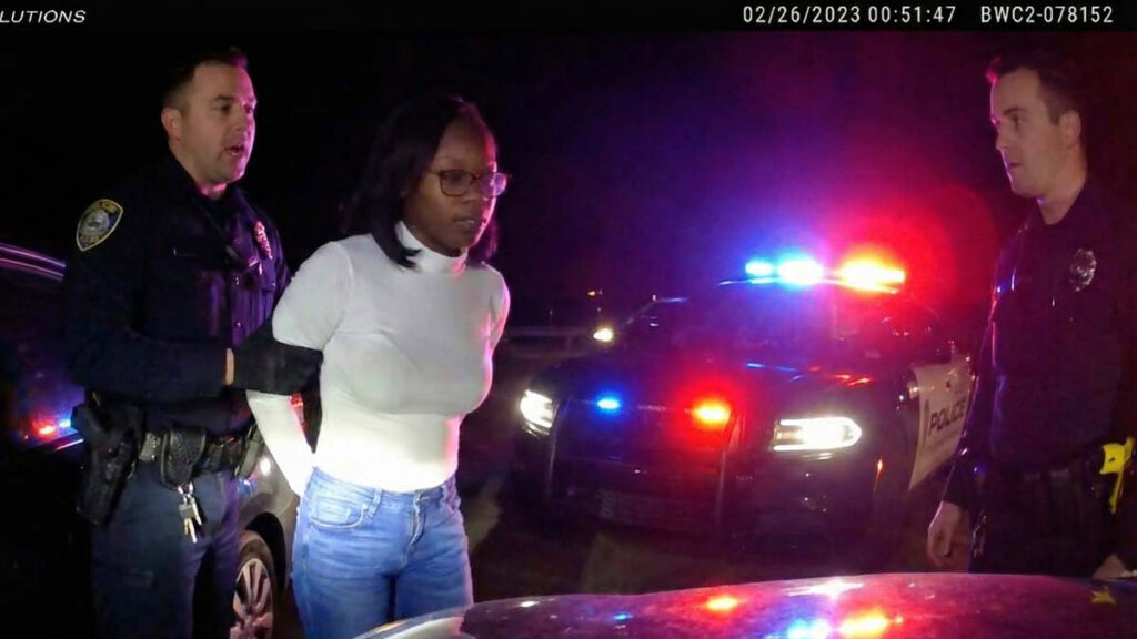 Highlands NJ DWI Arrest showing police cruiser lights at night.