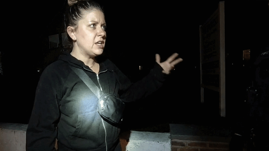 Belligerent Audi driver DWI arrest scene showing white convertible and police lights.