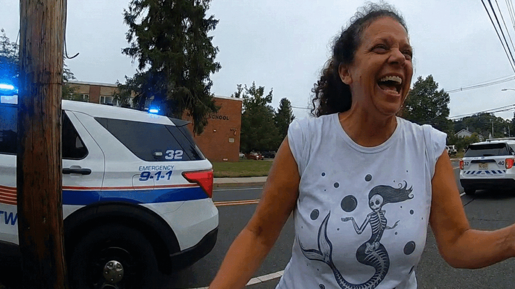 Middletown Residential Burglary Arrest showing officers at the scene investigating a residential property.