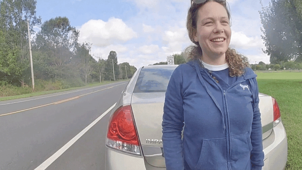 Colts Neck DUI Arrest scene showing police cruiser and suspect vehicle.