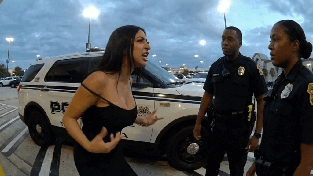 International Mall Credit Card Fraud Arrest showing officers at the scene.