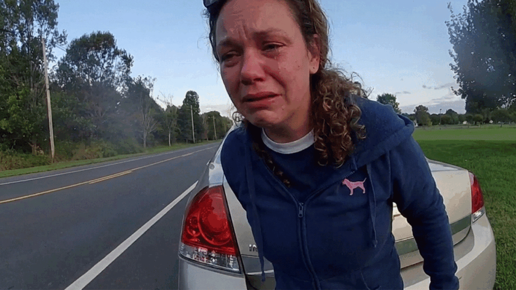 Colts Neck DUI Arrest scene showing police cruiser and suspect vehicle.