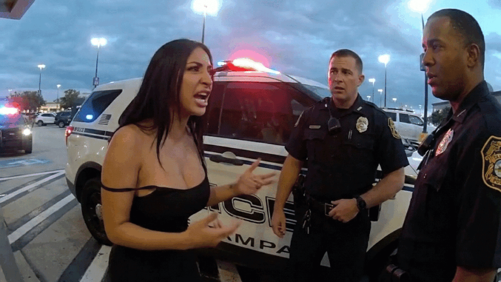 International Mall Credit Card Fraud Arrest showing officers at the scene.