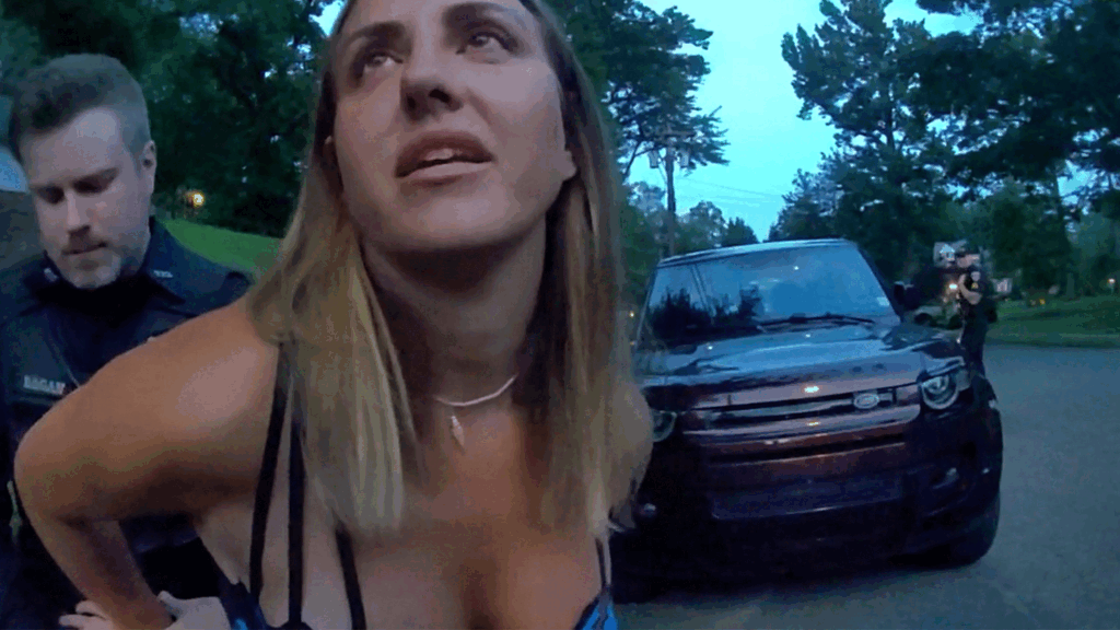 Paige Koff Westfield DUI Arrest showing officers conducting field sobriety tests on Minisink Way.