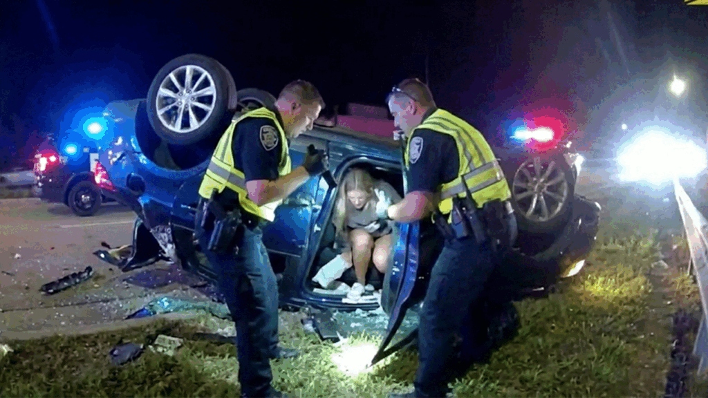 Naperville DUI Rollover Crash showing officers at the scene on Route 59.