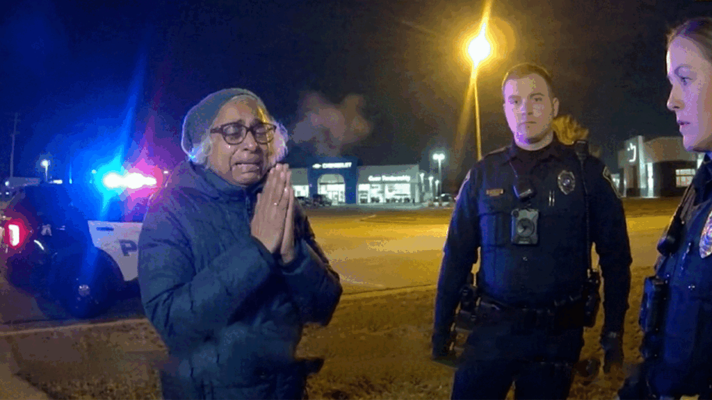 St. Charles DUI Arrest showing officers conducting a field sobriety test on East Main Street.