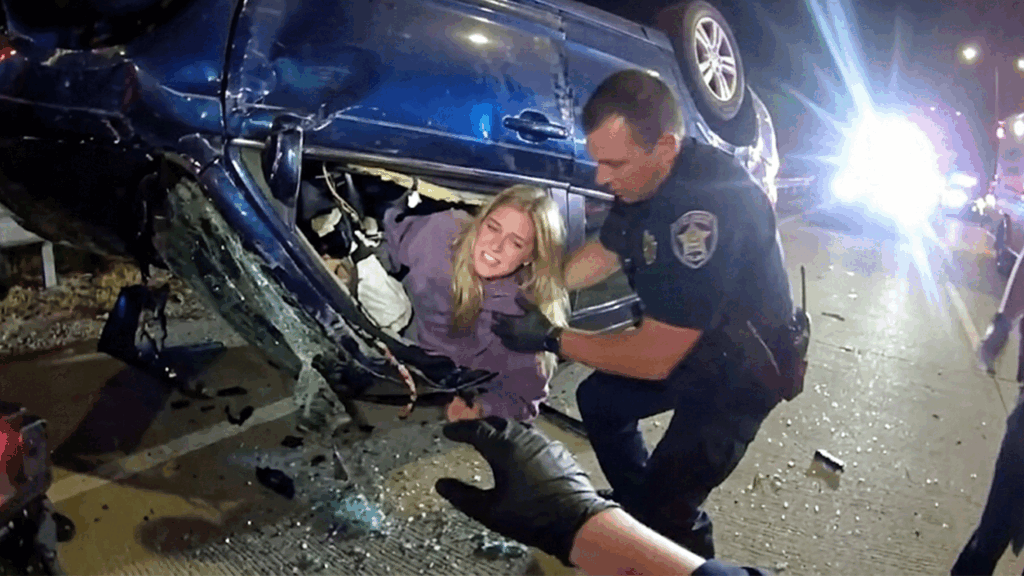 Naperville DUI Rollover Crash showing officers at the scene on Route 59.