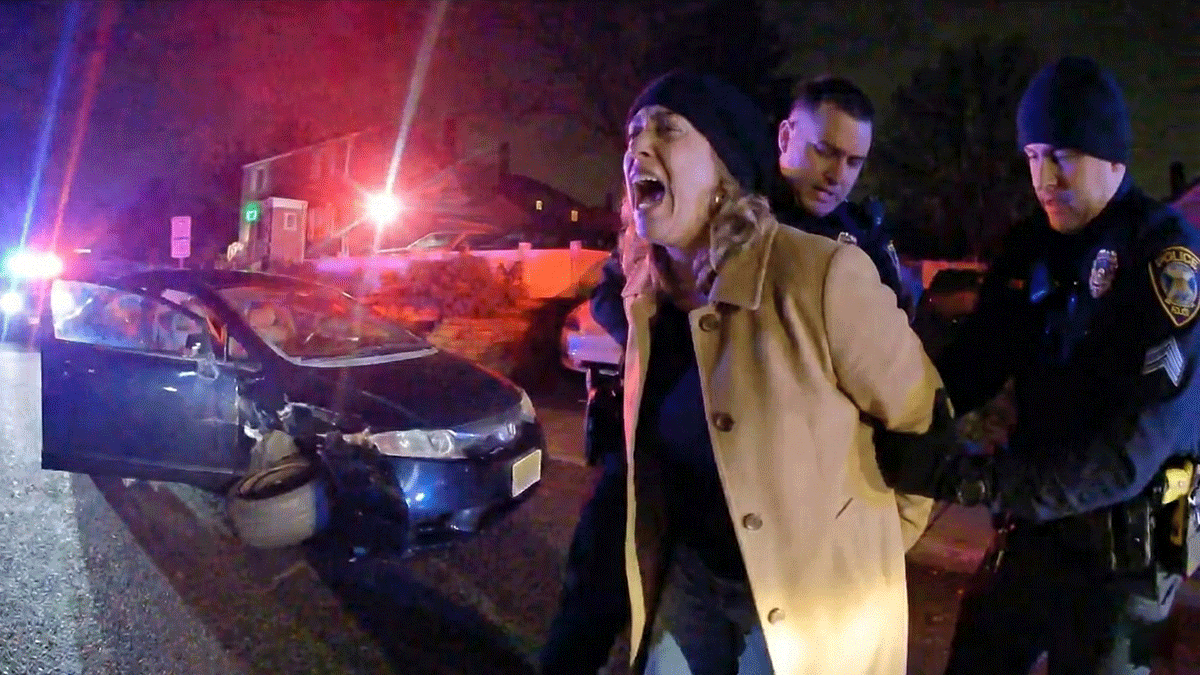 Library Director DWI Arrest scene showing damaged Honda Civic and Teaneck police officers.