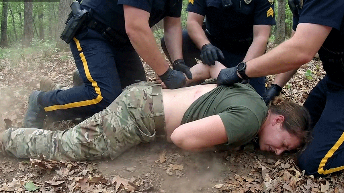 Colts Neck Police Bodycam showing officers arresting suspect Amanda Johnson in the woods.