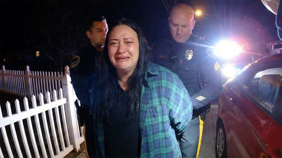 Highlands DWI arrest bodycam showing police lights and a red Hyundai on a dark highway.