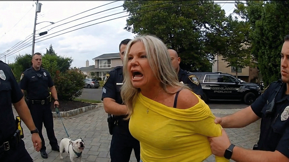 Highlands NJ DUI Hit and Run showing officers investigating a white Infiniti SUV.