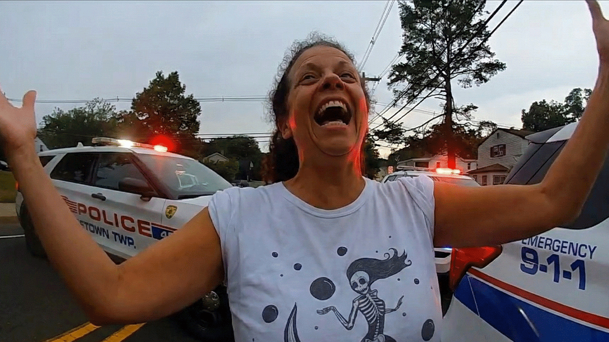 Middletown Residential Burglary Arrest showing officers at the scene investigating a residential property.