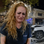 Red Bank DWI arrest scene showing police officer speaking with suspect Emily Wilson on Broad Street.