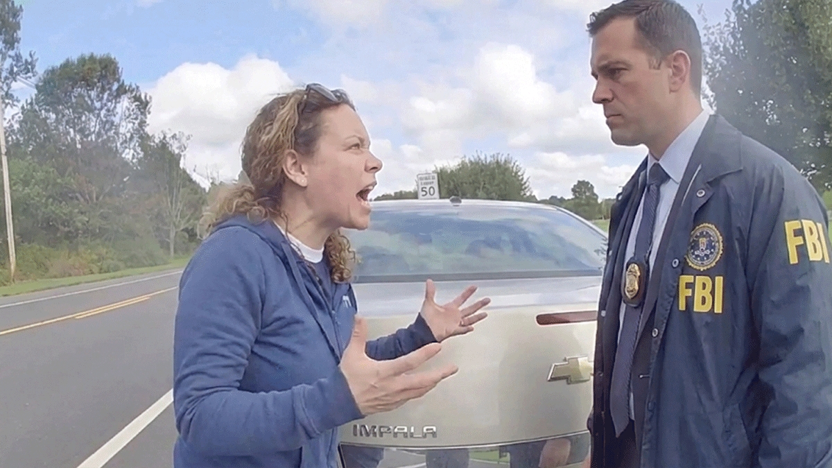 Colts Neck DUI Arrest scene showing police cruiser and suspect vehicle.