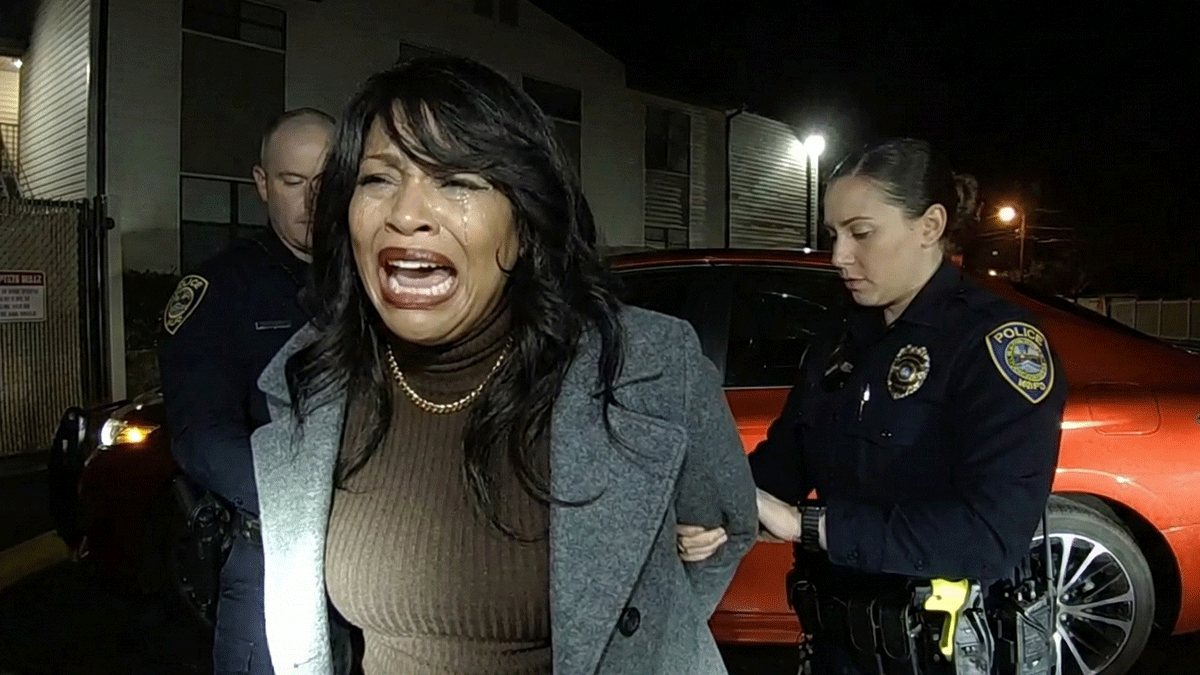 Monmouth Beach DWI Arrest showing officers conducting field sobriety tests in a parking lot.