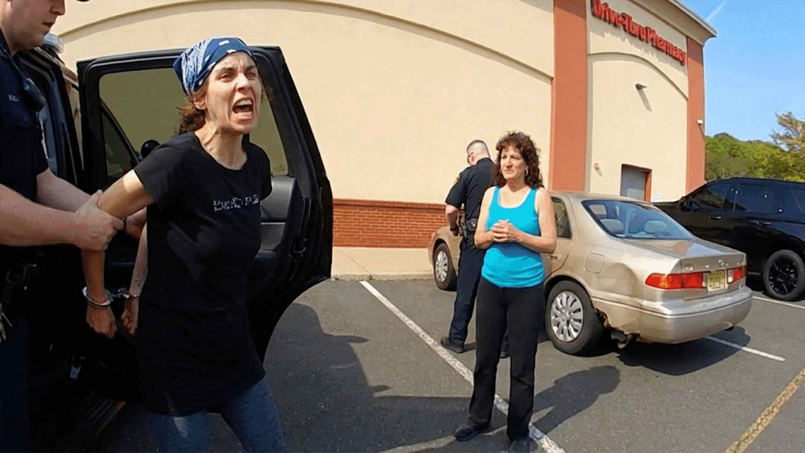 Highlands NJ Traffic Stop Drug Arrest showing police questioning driver and passengers.