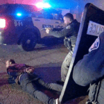 high-speed Monroe police chase showing officers at the scene.