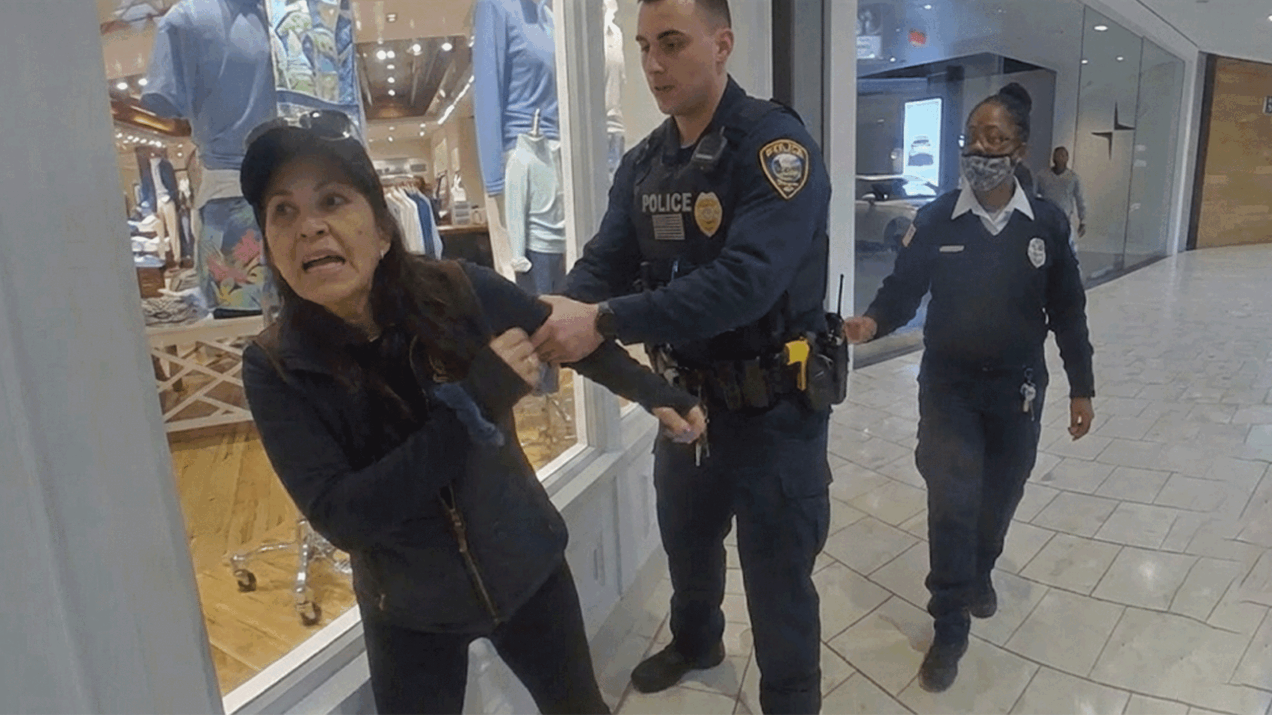 Short Hills Mall Shoplifting Arrest showing police confronting a suspect with stolen Versace sunglasses.