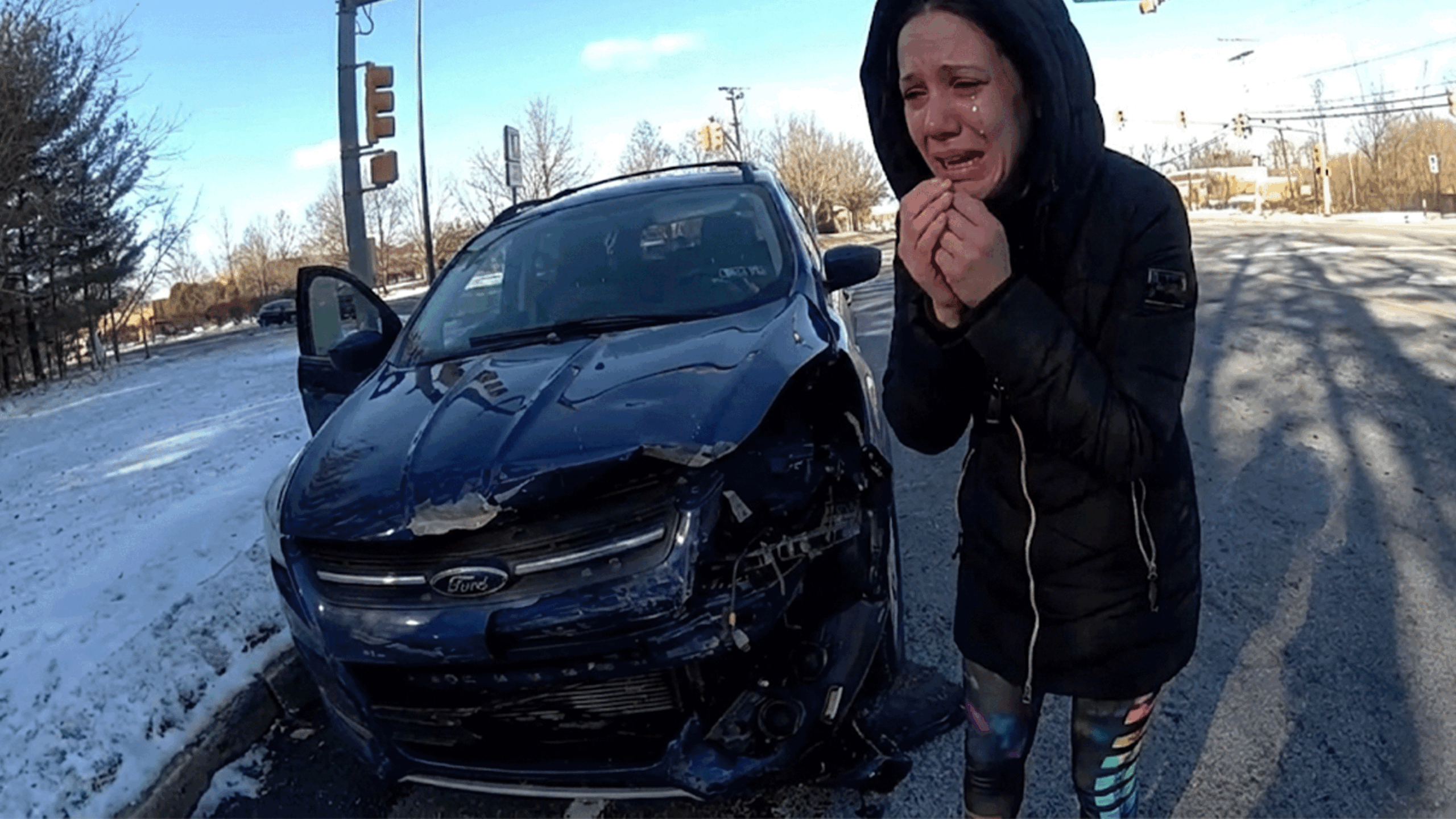 Holmdel car crash arrest scene with officers interviewing drivers.