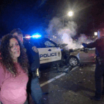 Colts Neck DWI Police Crash scene showing Officer Mason's patrol vehicle and black Lexus SUV.