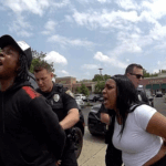 Evesham Lululemon shoplifting arrest showing officers detaining suspects in the Promenade parking lot.